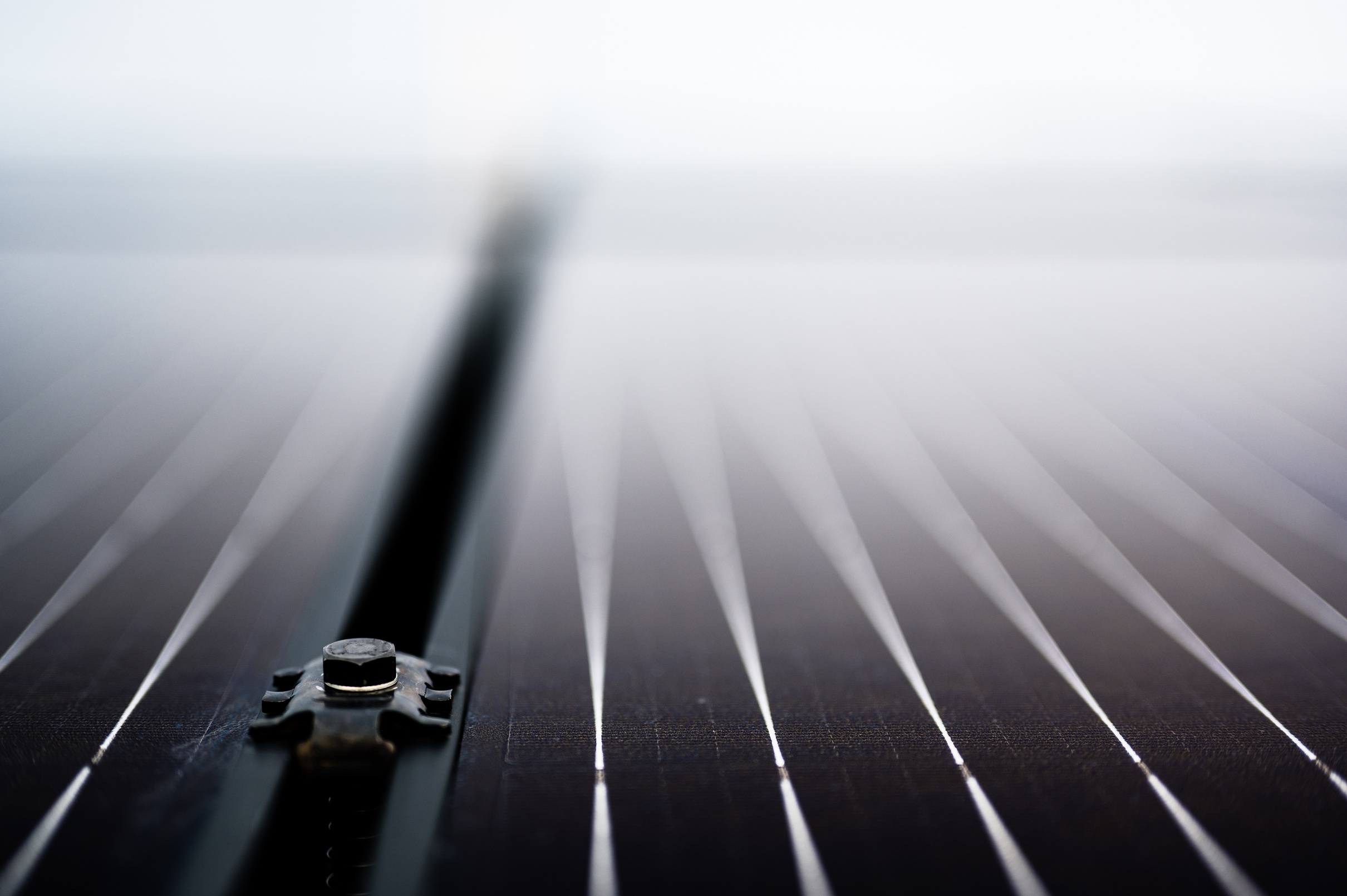 Bracket to Solar Panel on a Residential Asphalt Shingle Roof